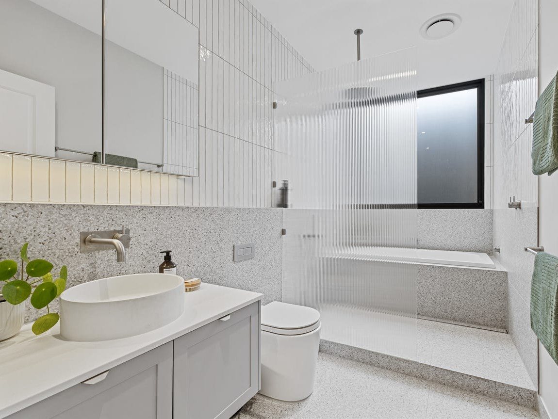 Thornbury main bathroom renovation with terrazzo and a glazed shower
