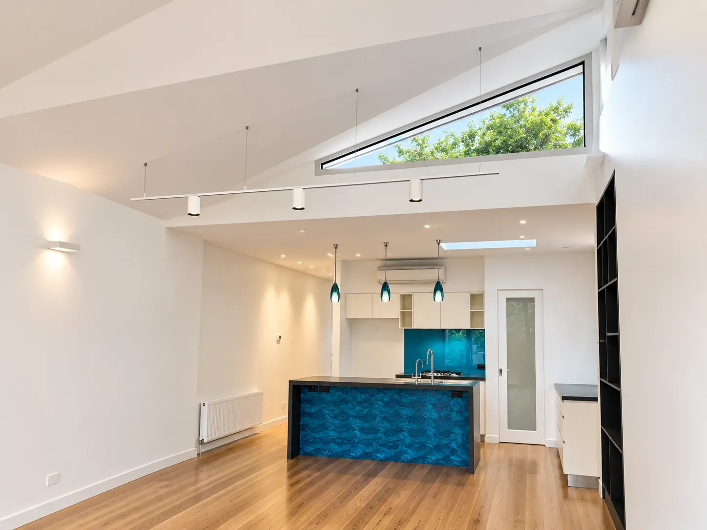 Folded origami plaster ceilings to reflect the light through highlight louvre windows — Elwood extension and upgrade - also heritage work in Elwood, Melbourne